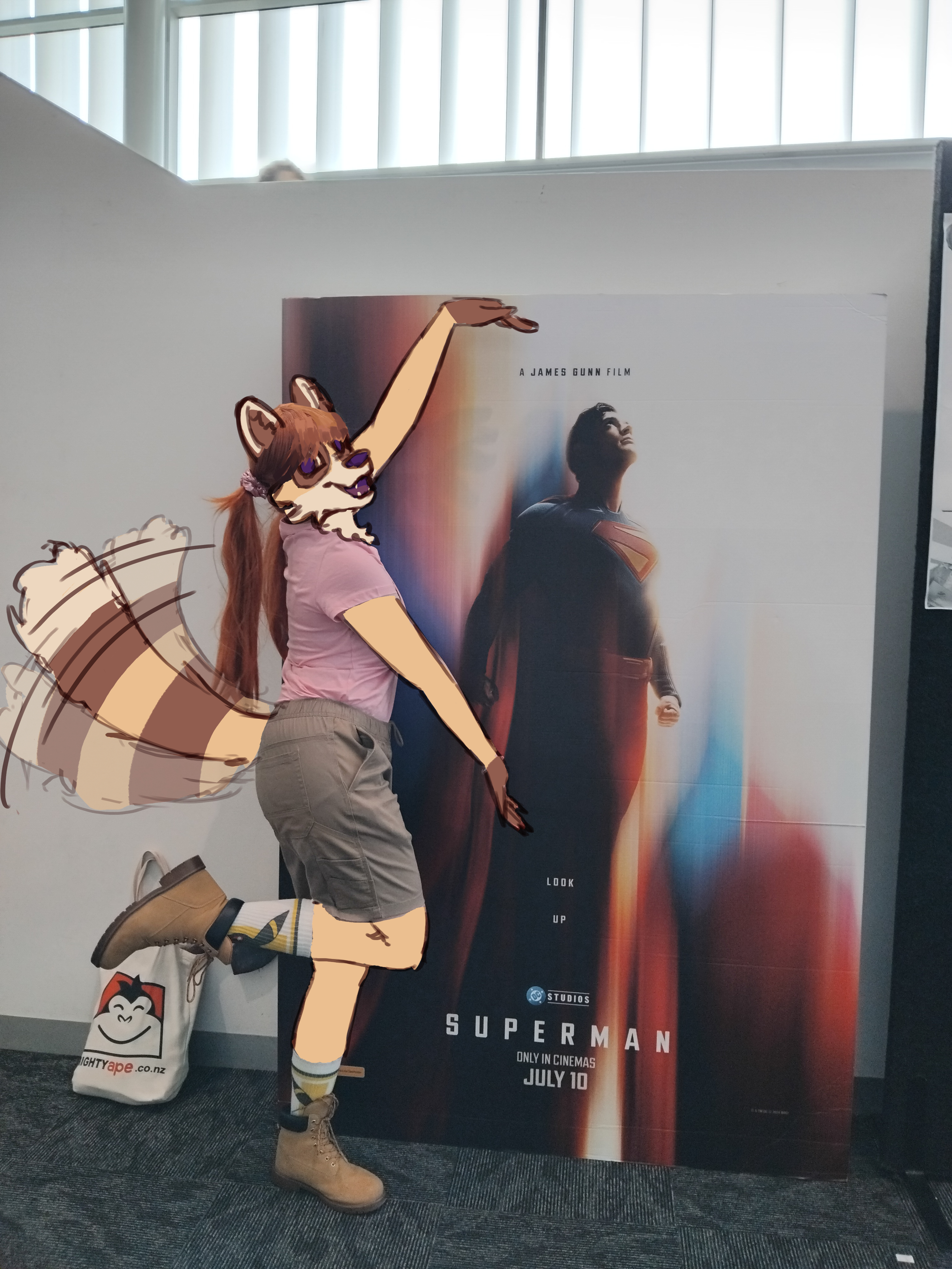 me in a girl jeri cosplay very poorly making a heart to a superman (2025) poster
